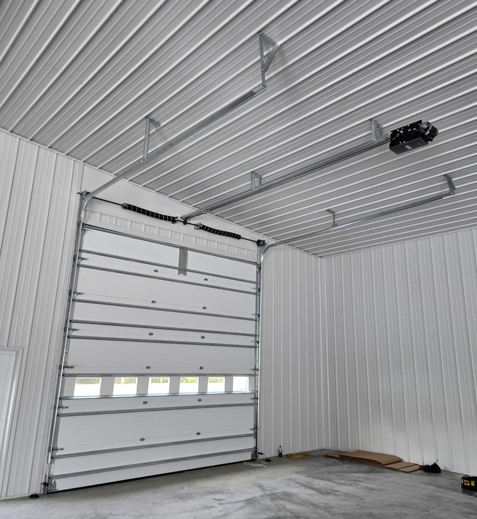A Newly Installed Garage Door and Trolley Operator
